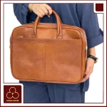 کیف اداری چرم طبیعی مدل سیروان عسلی فاوتر
